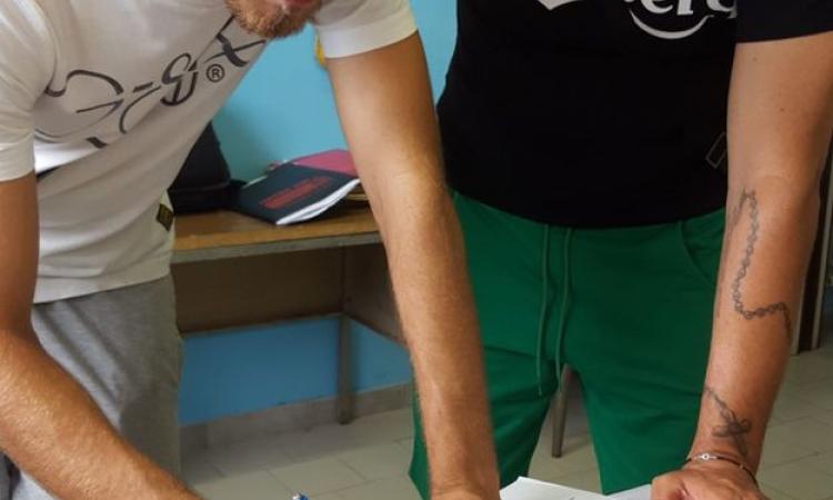 Loria assieme a Guida durante la firma